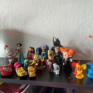 Set of 20 random Plastic Figurine toys Disney , Nickelodeon and more
